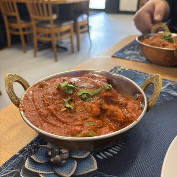 Friends Circle Indian Eatery signature dishes Chicken Tikka Masala, Masala Dosa, Lamb Pepper Fry.